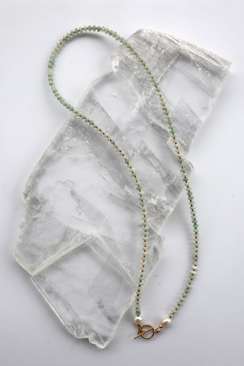 auread-designs-amara-necklace-amazonite-freshwater-pearl-flat-lay.jpg