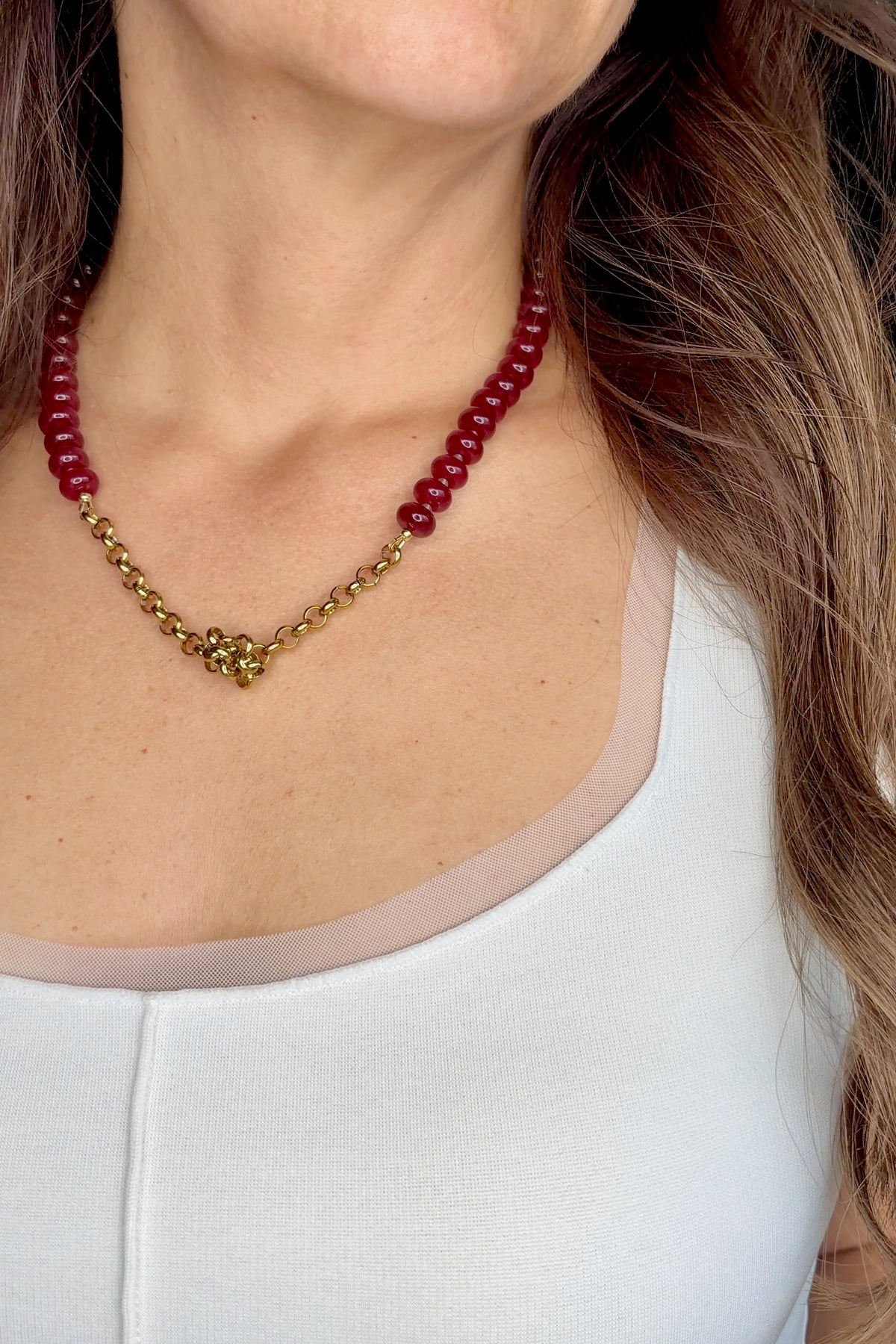Carmina red jade necklace by Auréad Designs, worn without pendant showing knotted gold rolo chain
