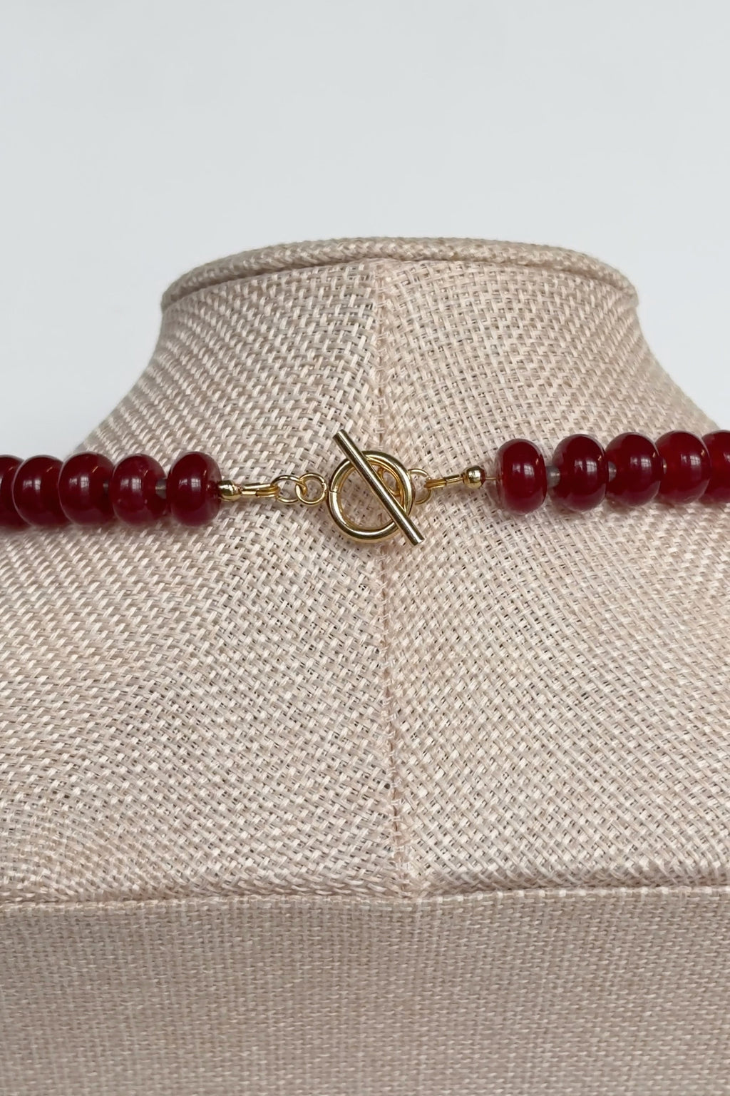 Carmina red jade necklace by Auréad Designs, detail view of gold toggle clasp