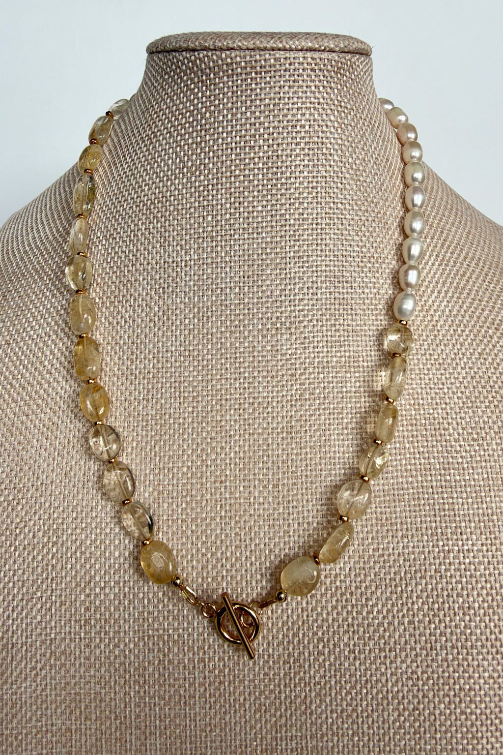 Dawn citrine and freshwater pearl necklace by Auréad Designs on linen bust form, toggle clasp worn in front