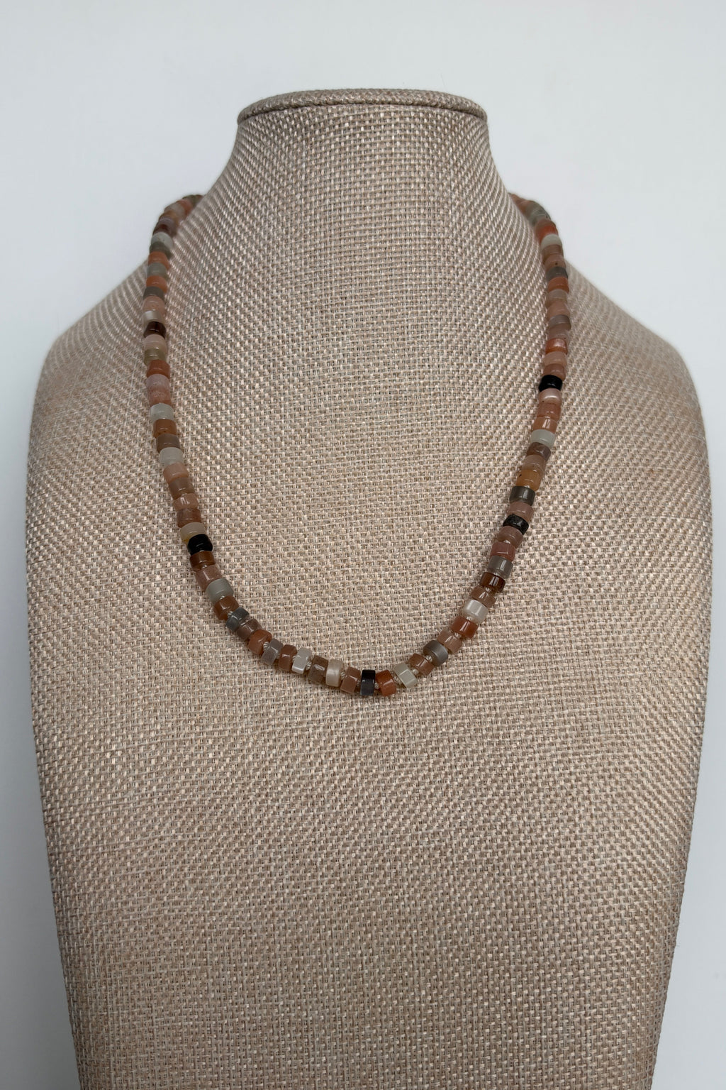 Maeven moonstone heishi necklace by Auréad Designs styled on bust form at collarbone length