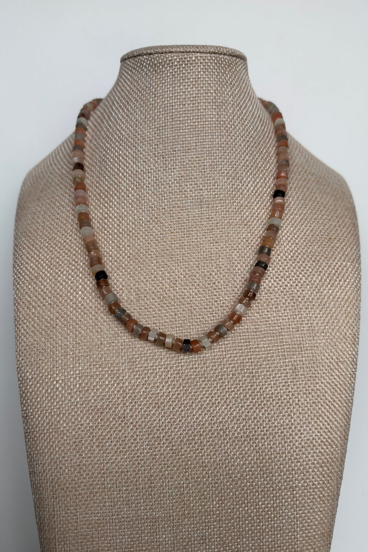 Maeven moonstone heishi necklace by Auréad Designs styled on bust form at collarbone length