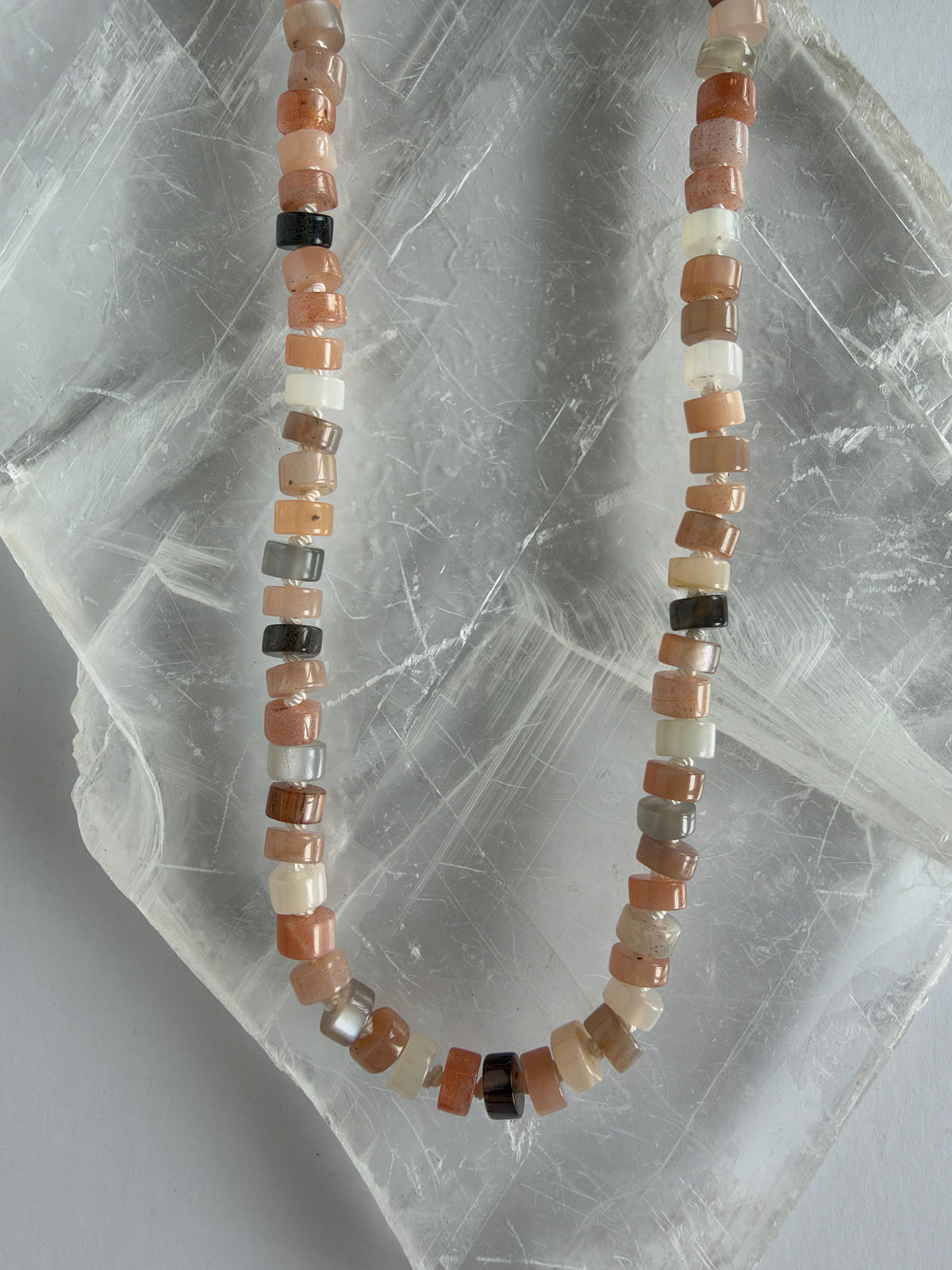 Maeven moonstone heishi necklace by Auréad Designs close up of bead texture and color variation
