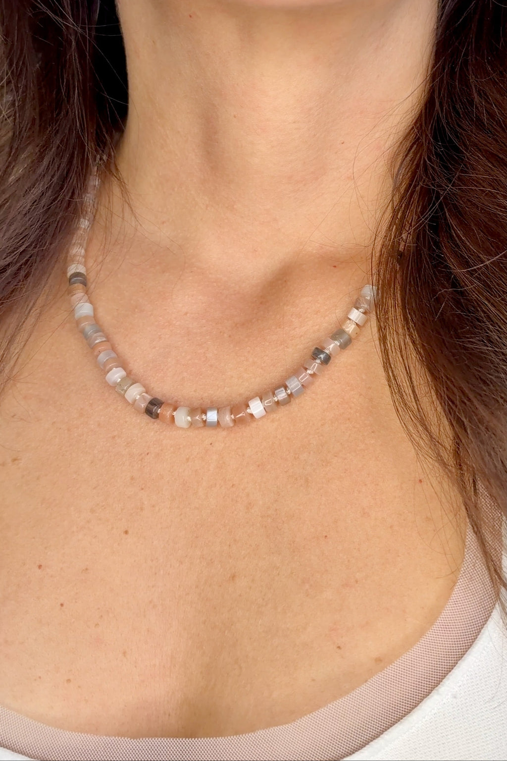 Maeven moonstone heishi necklace by Auréad Designs worn at collarbone length