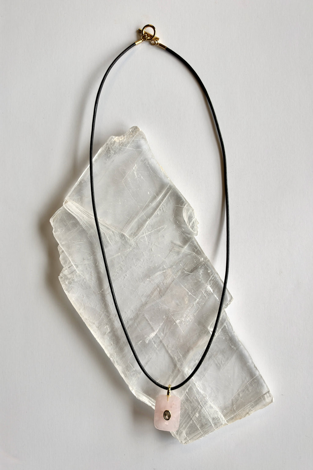 Rosenne rose quartz pendant necklace by Auréad Designs full length flat lay showing toggle clasp