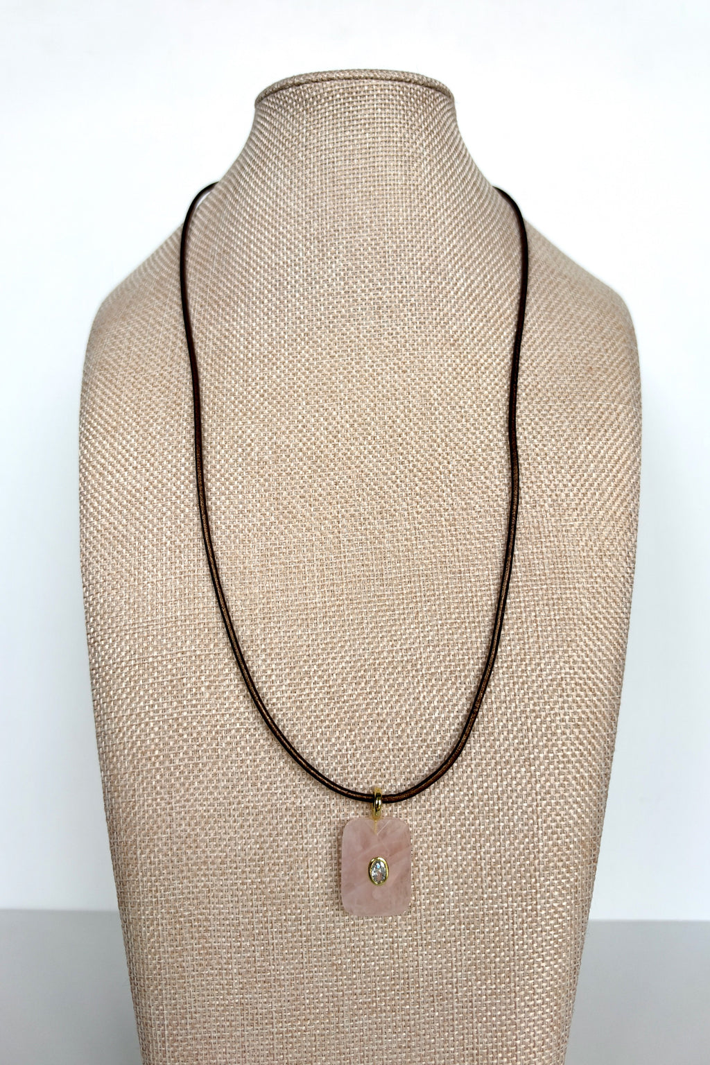 Rosenne rose quartz faceted pendant necklace by Auréad Designs displayed on linen bust form