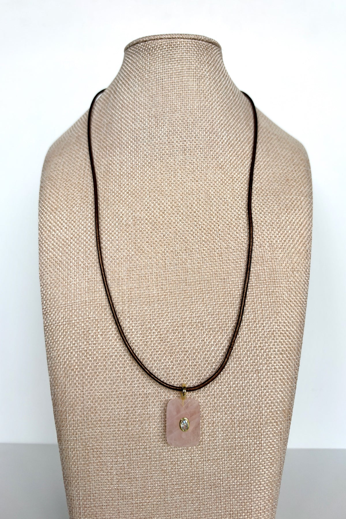 Rosenne rose quartz faceted pendant necklace by Auréad Designs displayed on linen bust form