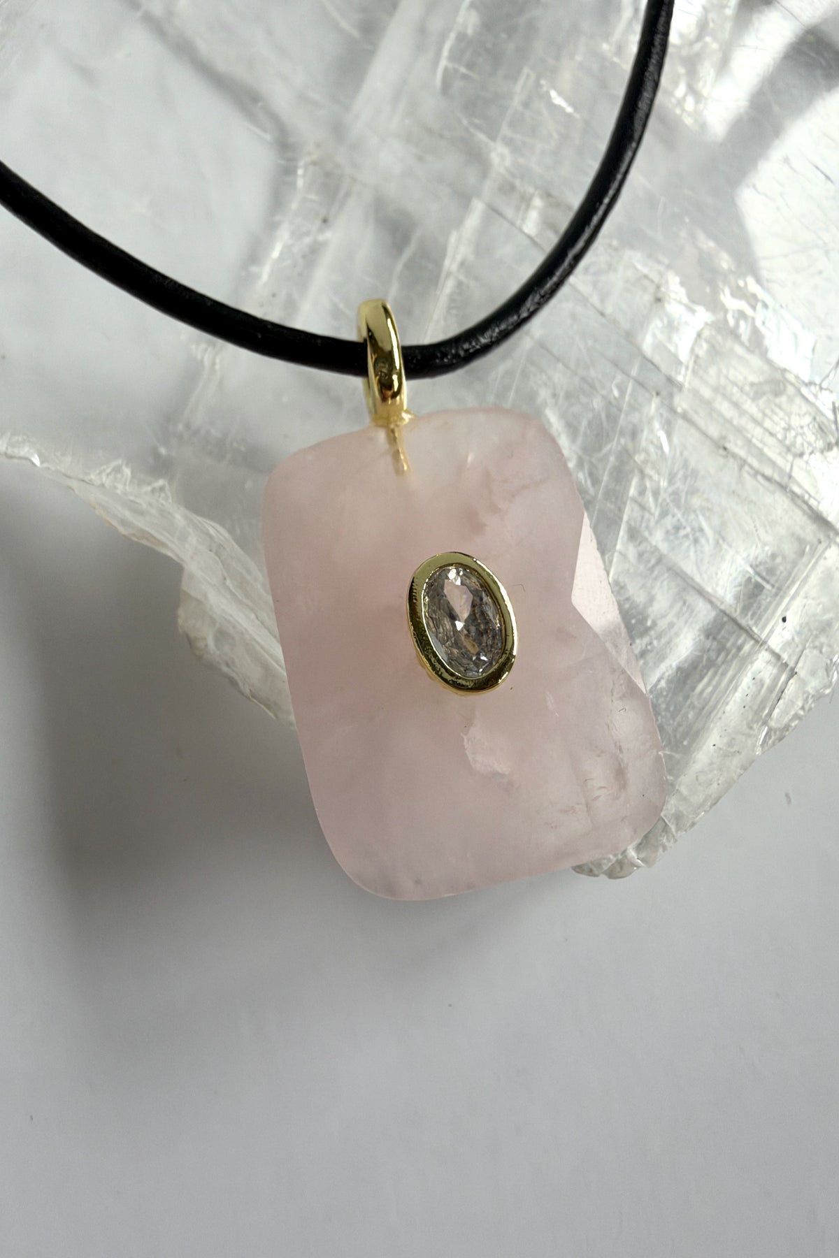 Rosenne rose quartz faceted tablet pendant necklace by Auréad Designs close up of stone and CZ accent