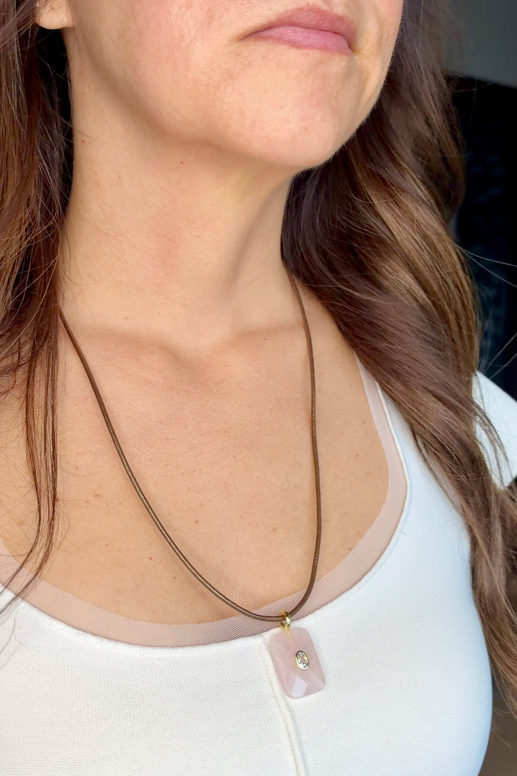 Rosenne rose quartz pendant necklace by Auréad Designs worn on bronze leather cord at chest length