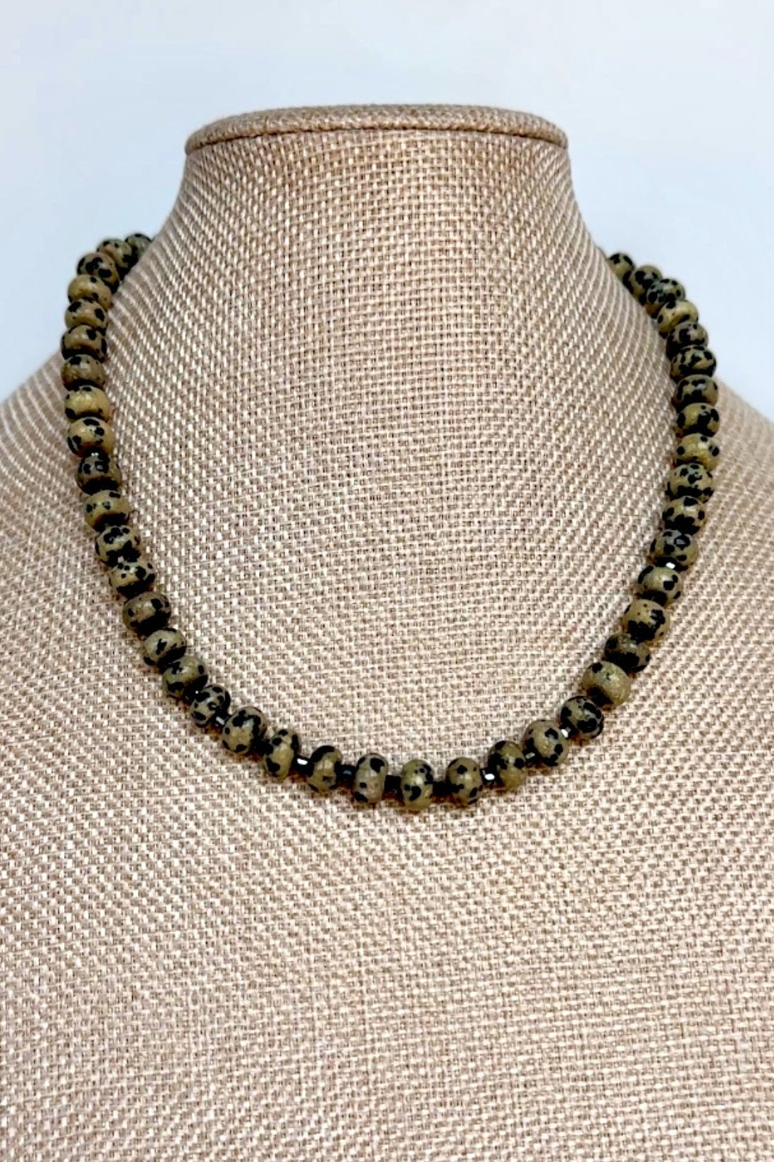 Tessere Dalmatian jasper and hematite beaded necklace by Auréad Designs displayed on linen bust form