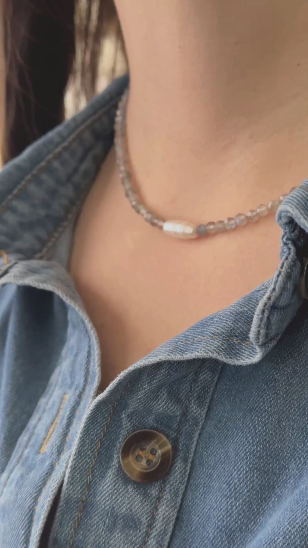 Liora labradorite necklace by Auréad Designs — handmade gemstone necklace with gold accents, shown being worn