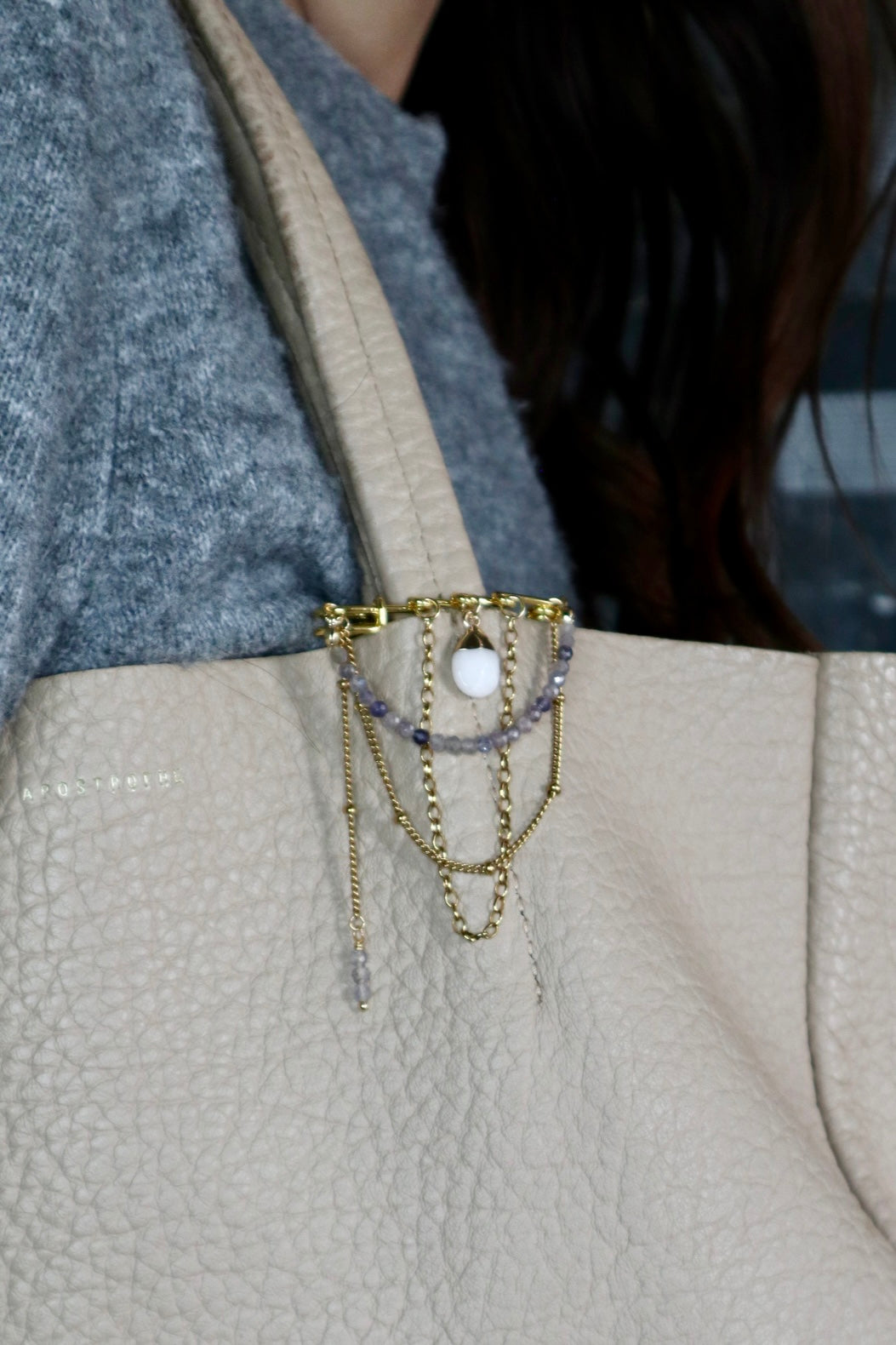 Celune Iolite pin brooch by Auréad Designs– handmade gemstone brooch with gold chain, show being worn