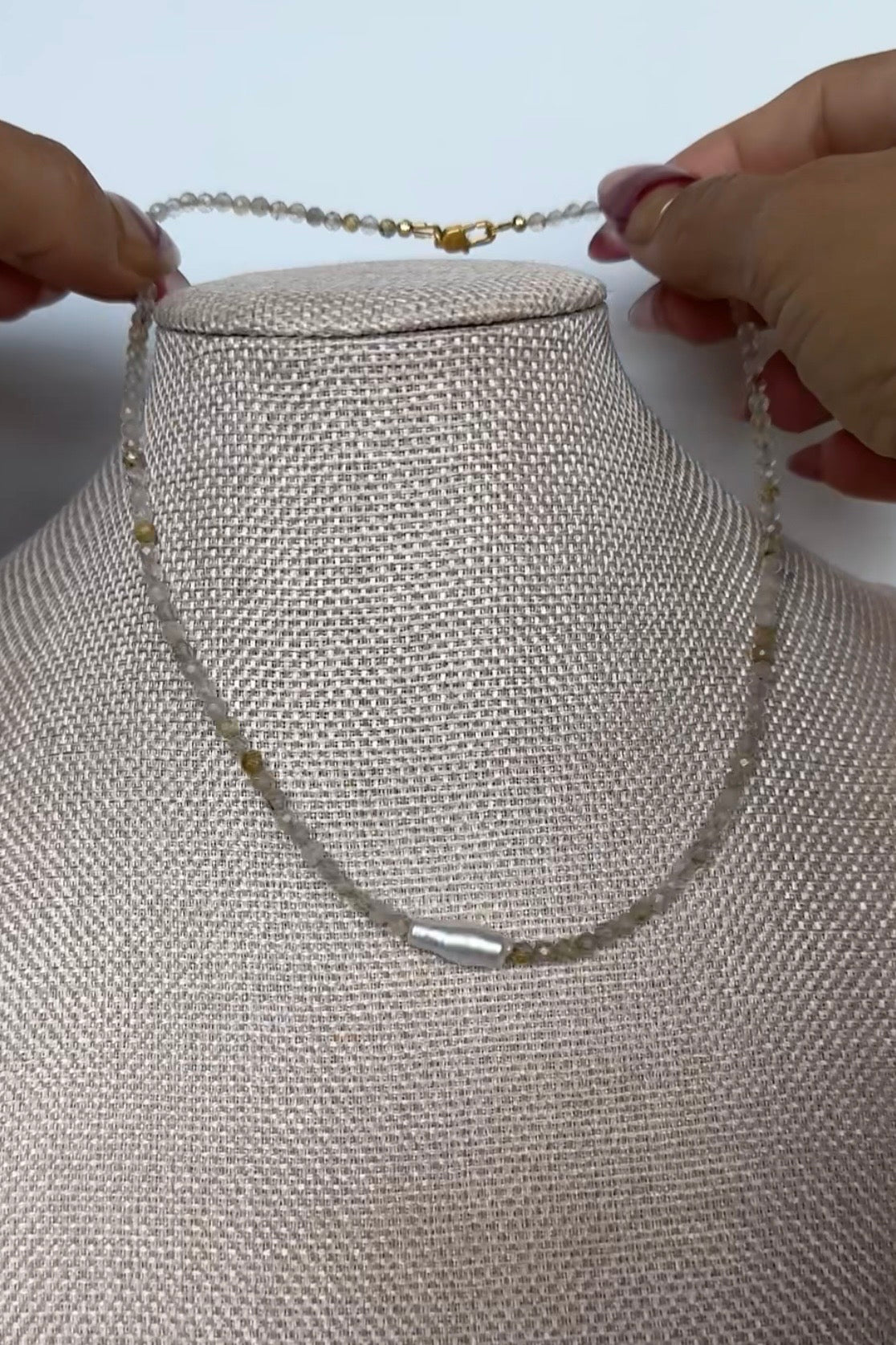 Auréad Designs Larch necklace product video — handmade golden rutilated quartz and baroque freshwater pearl necklace from the Glacier Collection, showing full piece, stone detail, and worn styling